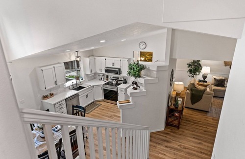 Post Falls House | Silverwood CDA Family Getaway Game Room Air Hockey Ping Pong Treehouse Yard AC