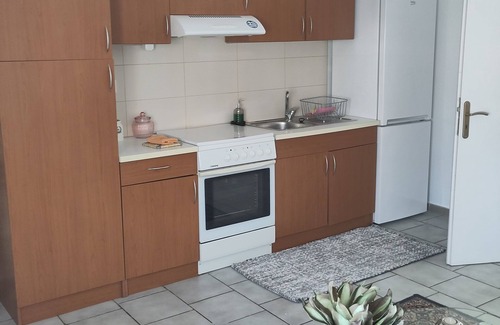 Ferma Apartment | Silvia's Meltemi apartment with mountain and sea views