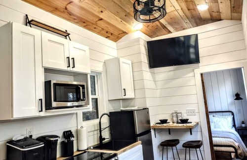 Ashley Oaks House | Simple meets modern in this farmhouse style tiny home!