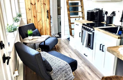 Ashley Oaks House | Simple meets modern in this farmhouse style tiny home!