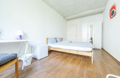 St. Gallen House | Simple Rooms - Yellow Inn