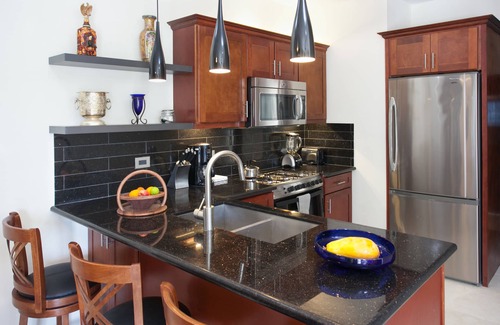 Simpson Bay Apartment | Simpson Bay Beach Modern Apartment. Roof deck Ocean Views WIFI Satellite TV.