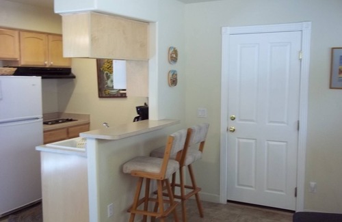 Village Grove House | Single level standalone cottage 1 bedroom 1 bath with attached garage