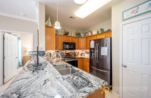 Safe Harbor House | Single Story 3 bedroom townhome just off of 11th. King bed
