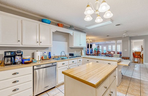 Saltillo House | Single-story home with private deck, grill, fireplace, & W/D