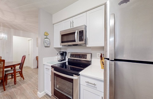 Sarasota Springs House | Single-story home with private yard, enclosed patio, updated interior, & W/D