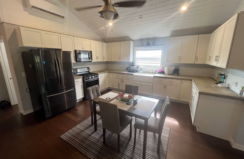 Upper Bogue House | Siren's Song is a beautiful waterfront home in the community of Whale Point