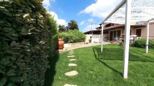Porto Pollo House | Sissi House - Trilocale con Giardino - Porto Pollo