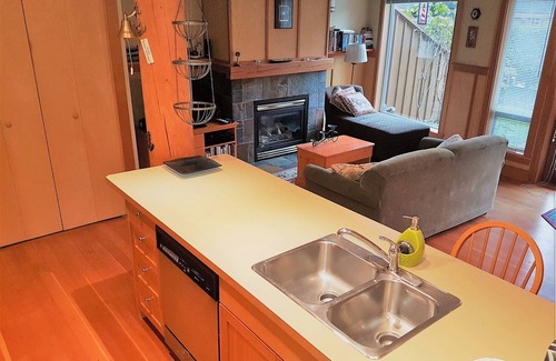 Tofino Condo | Sit and relax in the sun in your yard, or walk 2 minutes to Chesterman beach