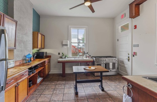 Mid-City Bed & Breakfast | Site 61 Historic Guesthouse - 9 Rooms, 13 Beds