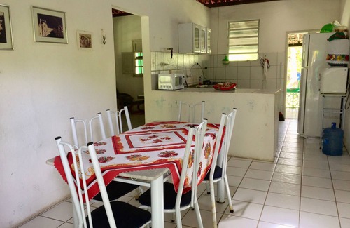 Goiana House | Site with country house surrounded by greenery and leisure equipment