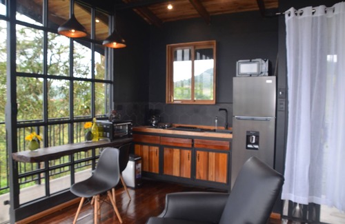 La Fortuna Apartment | Sitting on stilts, Stuido Wow has spectacular volcano, lake & rain forest views!