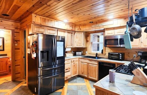 Trowbridge Park House | Six bedroom home with a hot tub, pool and an outdoor bar on a two acre lot.