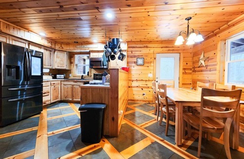 Trowbridge Park House | Six bedroom home with a hot tub, pool and an outdoor bar on a two acre lot.