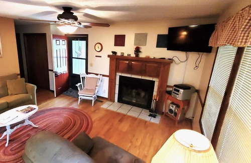 Holiday Island Condo | Six-Person Hot Tub, Lakeside, King Beds, Fireplace!