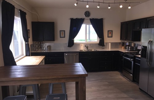Mount Vernon House | Skagit Valley Guest House bottom floor with stunning views of Mount Baker.