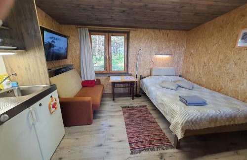 Pieriga House | Skaisto saulrietu namiņš