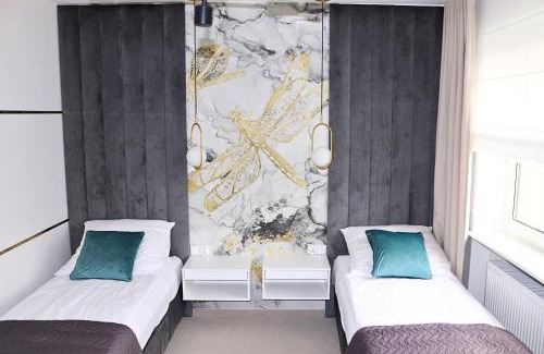 Ilawa Resort | Skarbek Iława, pokoje i apartamenty