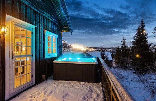Svingvoll Ski Chalet | Skeikampen cabin with mountain view, jacuzzi, and 8 bedrooms