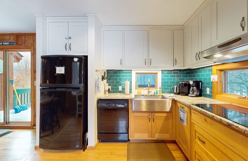 Waitsfield House | Ski home in the woods with a private hot tub & mountain views