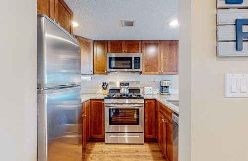 Ludlow Condo | Ski-in/out condo with mountain views, fireplace, pool, & hot tub