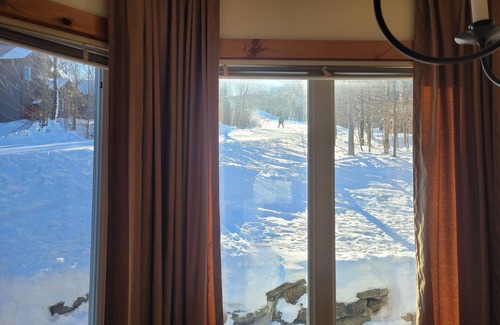 North Troy Condo | Ski in & out on Grammy Jay—right next to the ski run + view of Grammy Jay.