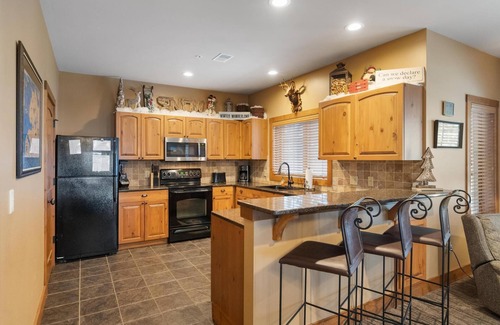 Boyne Falls Condo | Ski-In/Ski-Out 2BR Creekside Condo at Boyne Mountain w/Private Hot Tub!