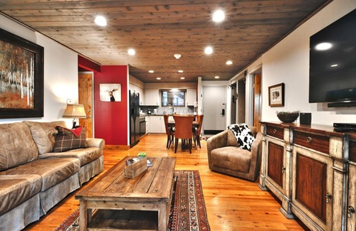 North Park City Condo | Ski-In/Ski-Out Chic Rustic Condo with Outdoor Hot Tubs and Pool! Year Round Fun!