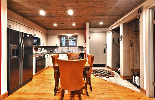 North Park City Condo | Ski-In/Ski-Out Chic Rustic Condo with Outdoor Hot Tubs and Pool! Year Round Fun!
