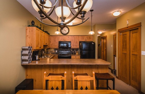 Sun Peaks Condo | Ski in Ski out condo with private Hot Tub backing on Golf course. 2 bed 2 bath.