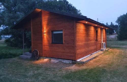 Tomelilla House | Skogsbäckens stugby AB