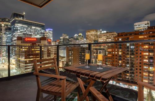 Eau Claire Apartment | Sky Jungle Oasis Calgary City Views Parking & Gym