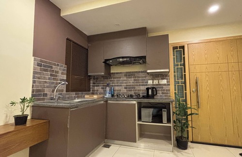 Islamabad Condo | Skyluxe Cozy Designer Suite + Rooftop Pool Self-Checkin