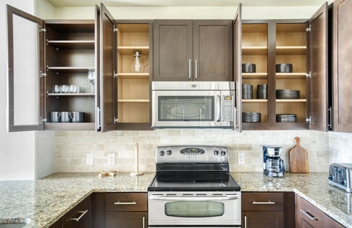 Second Street District Apartment | Sleek Downtown 1BR w/Gym, W/D & Deck, walk to 6th St bars, by Blueground