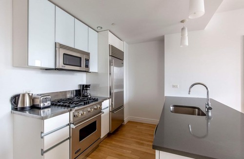 Hell's Kitchen Apartment | Sleek Midtown West 2BR w/ Gym & W/D, nr Hudson River Park, by Blueground
