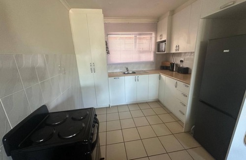 Parow North Apartment | Sleek Modern Luxury Pool Side Apartment