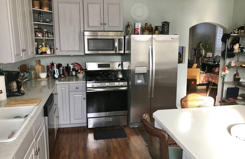Schnitzelburg House | Sleep like a king in king-size beds in Louisville's Germantown neighborhood