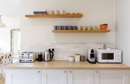 Chichester House | Sleeps 10 plus, parking, wood burner, enclosed garden, WiFi, harbour village.