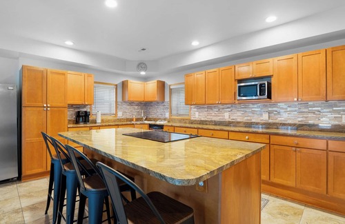 Barnett House | Sleeps 16! Waterfront Fun Near Jolly Roger’s | Private Dock & 4BR/4BA