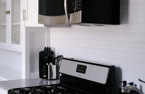 Irving Park East Apartment | Sleeps 7 Huge Projector Designated Workspace