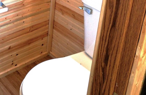 Lansing Hotel | Sleeps up to 2, electric, water, kitchenette, full bathroom, air conditioned/heated.