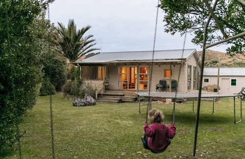Kairakau House | Slow & Relaxing Days at the cutest old school bach- family & pet-friendly