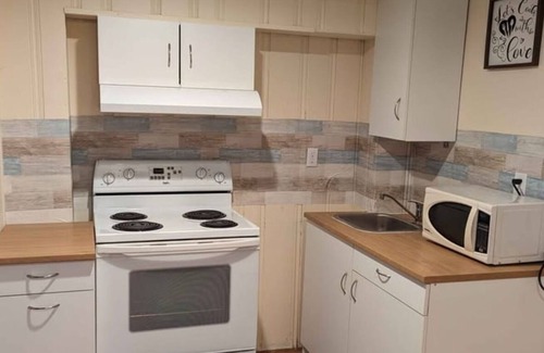 Regina House | Small and cozy basement suite