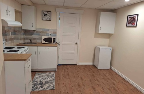 Regina House | Small and cozy basement suite