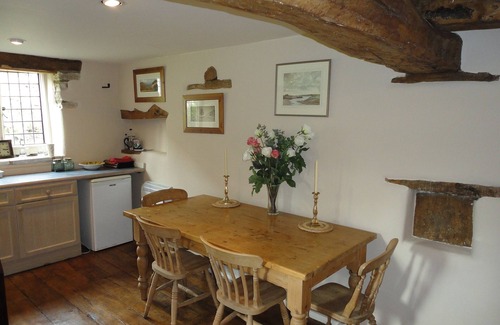Duntisbourne Abbots House | Small converted barn in peaceful village setting.