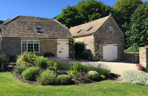 Duntisbourne Abbots House | Small converted barn in peaceful village setting.