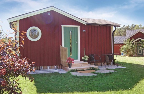 Sjotofta House | Small, well used cottage with terrace at the back.