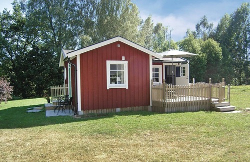 Sjotofta House | Small, well used cottage with terrace at the back.