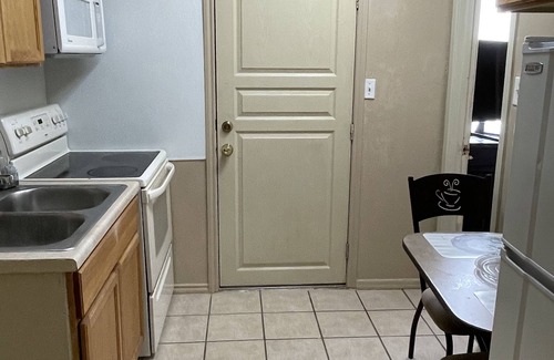 West San Antonio Apartment | “SMALLER PIECE OF HEAVEN” studio with a deck in the backyard
