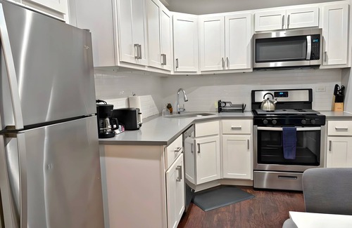 Boystown Apartment | Smart & Stylish 2-Bedroom Unit